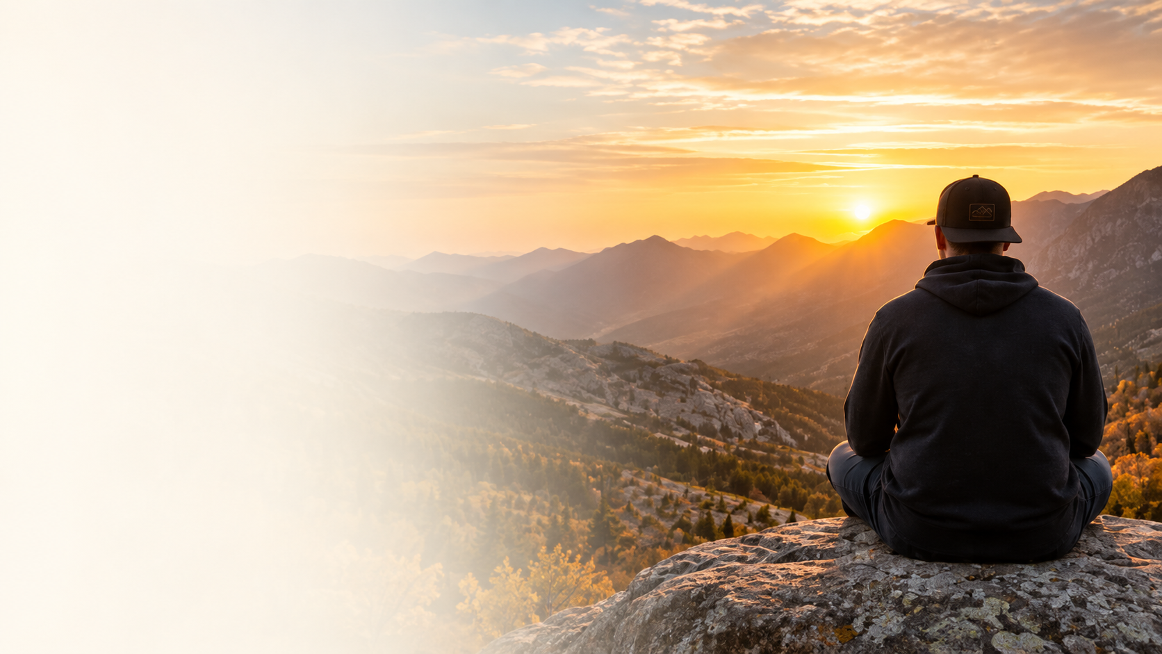 Community members sitting together on a rocky overlook at sunset in Northern Arizona
